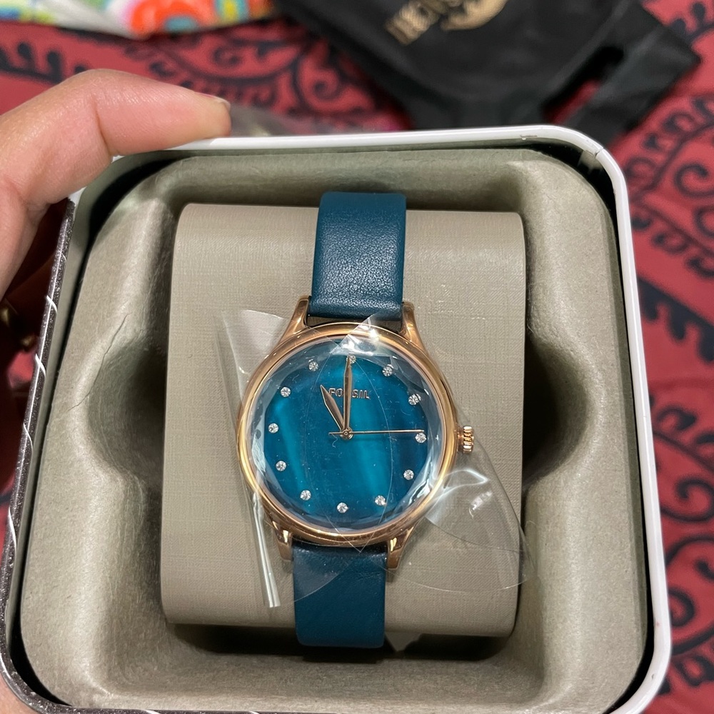 Fossil belt watch.